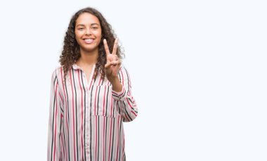 Gösterilen ve parmakları ile işaret güzel genç İspanyol kadın ikincisi ise kendinden emin ve mutlu gülümseyerek.