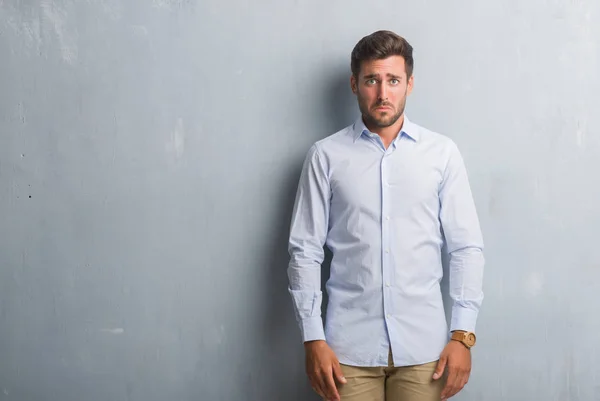 Handsome Young Business Man Grey Grunge Wall Wearing Elegant Shirt — Stock Photo, Image