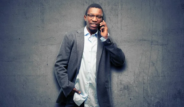 African Black Man Wearing Jacket Happy Talking Using Smartphone Mobile Stock Image