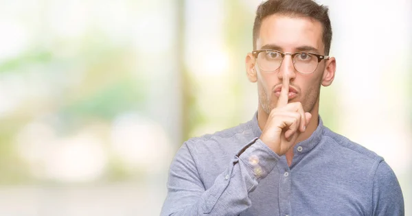 Handsome Young Elegant Man Wearing Glasses Asking Quiet Finger Lips — Stock Photo, Image