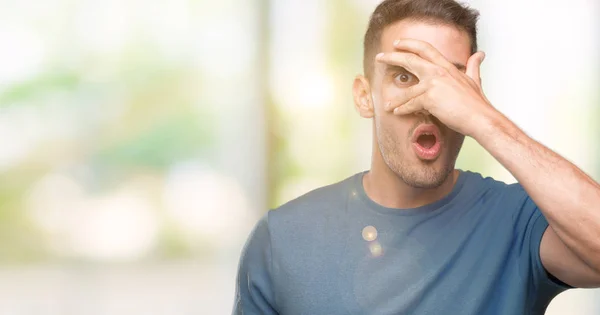 Handsome Young Casual Man Peeking Shock Covering Face Eyes Hand — Stock Photo, Image