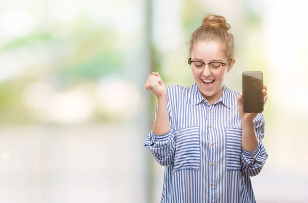 Young Blonde Woman Using Smartphone Screaming Proud Celebrating Victory Success — Stock Photo, Image