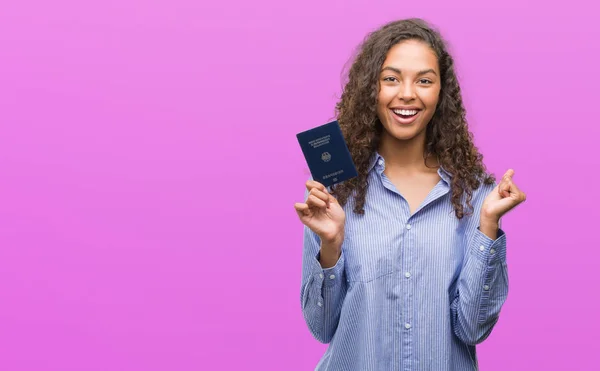 Jovem Hispânica Segurando Passaporte Alemanha Gritando Orgulhoso Celebrando Vitória Sucesso — Fotografia de Stock