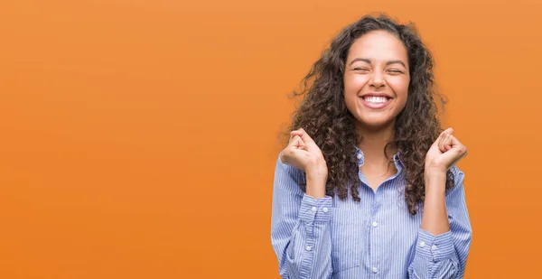 Young Hispanic Business Woman Excited Success Arms Raised Celebrating Victory — Stock Photo, Image