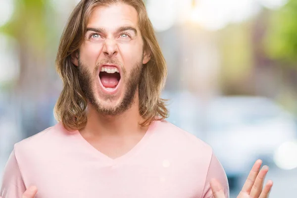 Joven Hombre Guapo Con Pelo Largo Sobre Fondo Aislado Loco —  Fotos de Stock