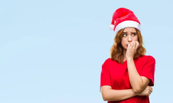 Joven Hermosa Mujer Sobre Fondo Aislado Usando Sombrero Navidad Mirando —  Fotos de Stock