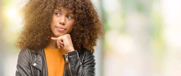 African American Woman Wearing Leather Jacket Serious Face Thinking Question — Stock Photo, Image