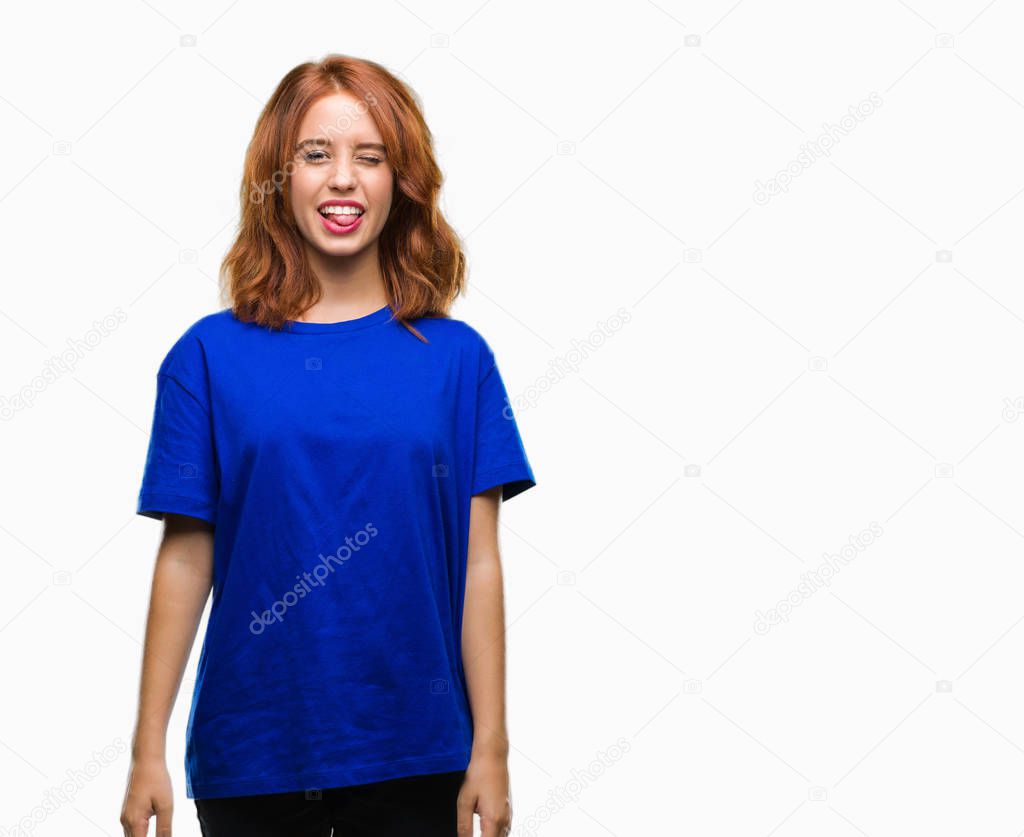 Young beautiful woman over isolated background sticking tongue out happy with funny expression. Emotion concept.