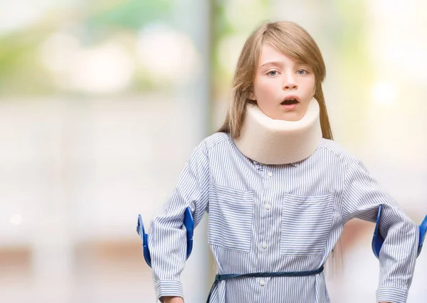 Young Blonde Child Injured Wearing Neck Collar Crutches Scared Shock — Stock Photo, Image