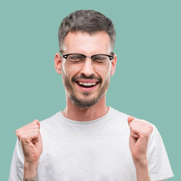 Young Tattooed Adult Man Excited Success Arms Raised Celebrating Victory — Stock Photo, Image