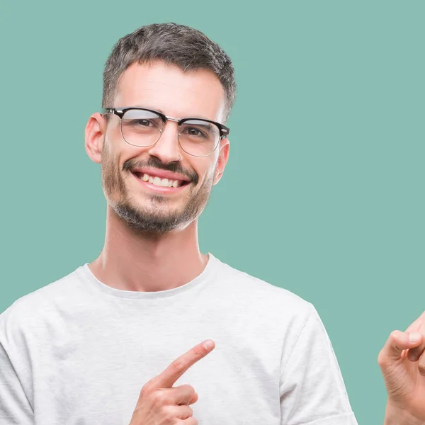 Young Tattooed Adult Man Smiling Looking Camera Pointing Two Hands — Stock Photo, Image