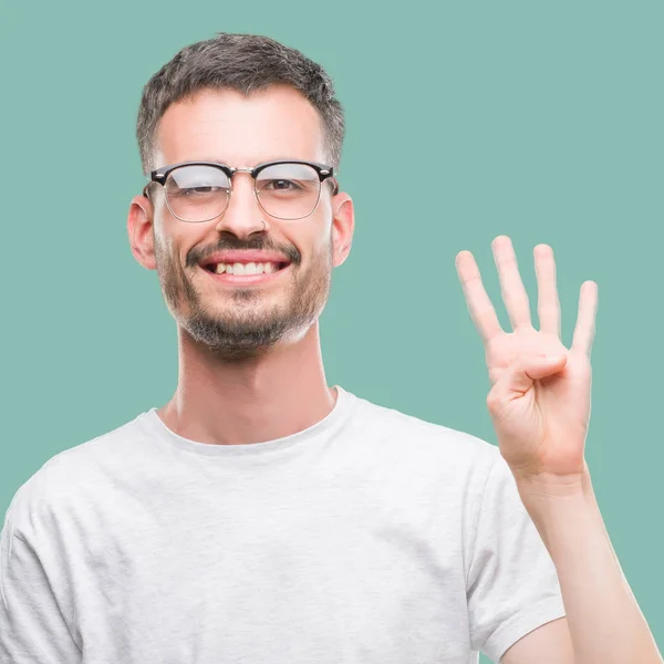 Junger Tätowierter Erwachsener Mann Zeigt Mit Finger Nummer Vier Nach — Stockfoto