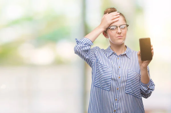 Young Blonde Woman Using Smartphone Stressed Hand Head Shocked Shame — Stock Photo, Image