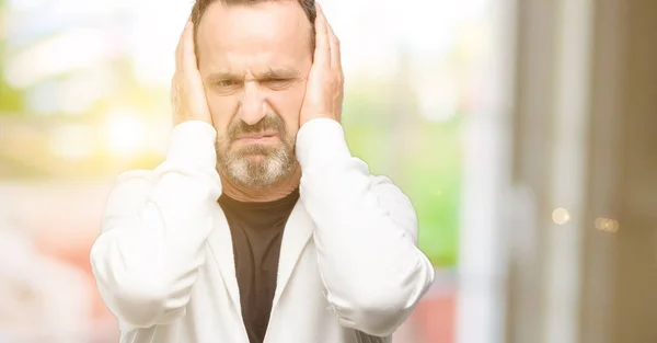 Middle Age Man Wearing Sportswear Covering Ears Ignoring Annoying Loud — Stock Photo, Image