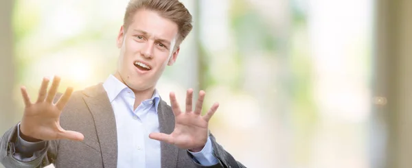 Young Handsome Blond Business Man Afraid Terrified Fear Expression Stop — Stock Photo, Image