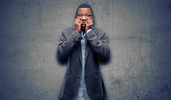 African black man wearing jacket terrified and nervous expressing anxiety and panic gesture, overwhelmed