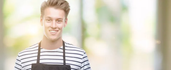 Young Handsome Blond Man Wearing Apron Happy Face Standing Smiling — Stock Photo, Image