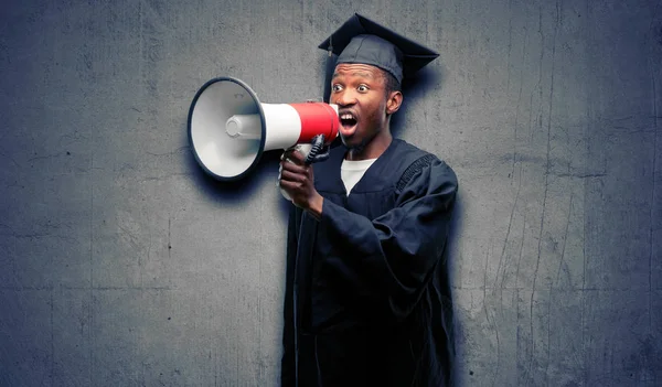 Young African Graduate Student Black Man Communicates Shouting Loud Holding — Stock Photo, Image