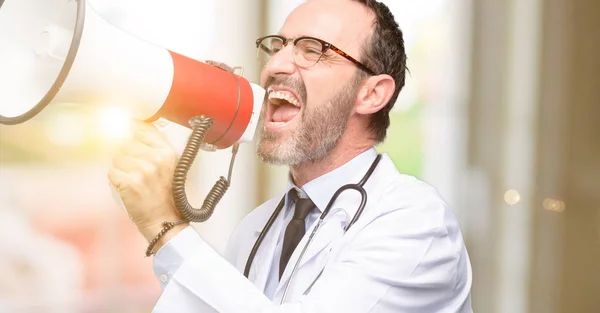 Doctor Senior Man Medical Professional Communicates Shouting Loud Holding Megaphone — Stock Photo, Image