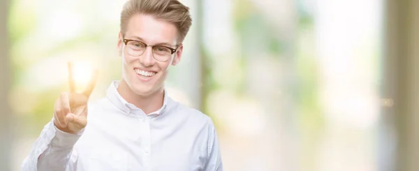 Young Handsome Blond Man Smiling Looking Camera Showing Fingers Doing — Stock Photo, Image