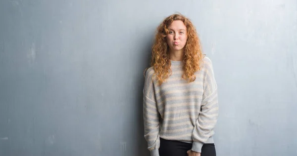Young Redhead Woman Grey Grunge Wall Puffing Cheeks Funny Face — Stock Photo, Image