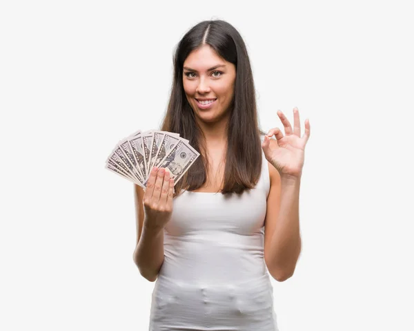 Young Hispanic Woman Holding Dollars Doing Sign Fingers Excellent Symbol — Stock Photo, Image