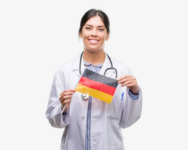 Joven Doctora Hispana Sosteniendo Bandera Alemania Con Una Cara Feliz —  Fotos de Stock