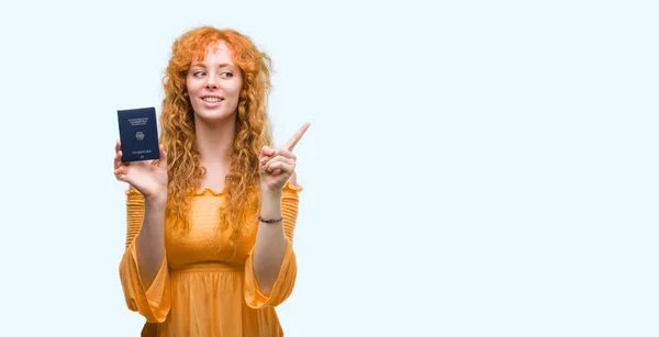 Young Redhead Woman Holding Passport Germany Very Happy Pointing Hand — Stock Photo, Image