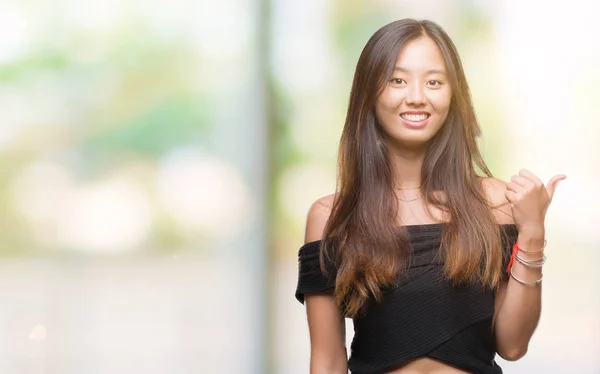 Young Asian Woman Isolated Background Smiling Happy Face Looking Pointing — Stock Photo, Image