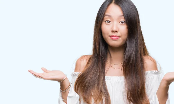 Young Asian Woman Isolated Background Clueless Confused Expression Arms Hands — Stock Photo, Image