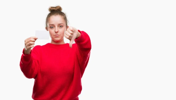 Young Blonde Woman Holding Advertising Card Angry Face Negative Sign — Stock Photo, Image