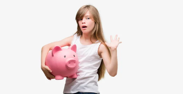 Young Blonde Toddler Holding Piggy Bank Very Happy Excited Winner — Stock Photo, Image