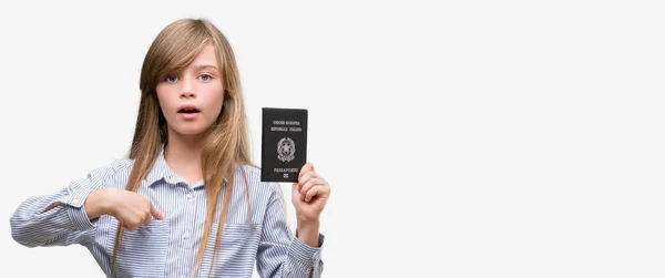 Young Blonde Toddler Holding Italian Passport Surprise Face Pointing Finger — Stock Photo, Image