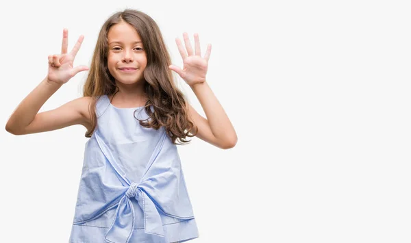 Brunette Hispanic Girl Showing Pointing Fingers Number Eight While Smiling — Stock Photo, Image