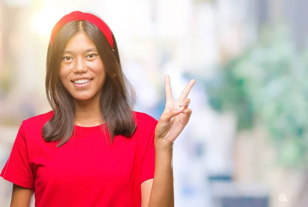 Young Asian Woman Isolated Background Smiling Happy Face Winking Camera — Stock Photo, Image