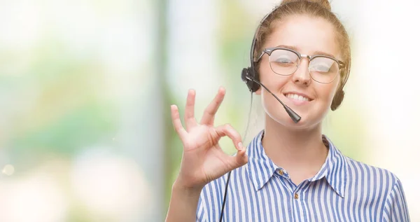 Young Blonde Call Center Operator Woman Doing Sign Fingers Excellent — Stock Photo, Image