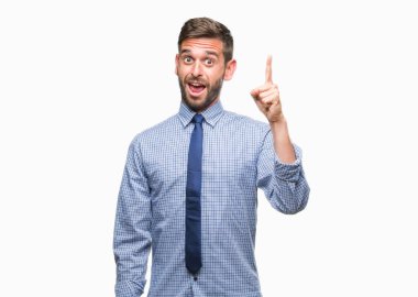 Genç yakışıklı iş adamı ile başarılı fikir parmağı yukarıyı izole arka plan üzerinde. Çıktıktan ve mutlu. Bir numara.