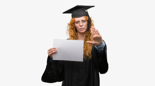 Young Redhead Woman Wearing Graduate Uniform Holding Degree Open Hand — Stock Photo, Image