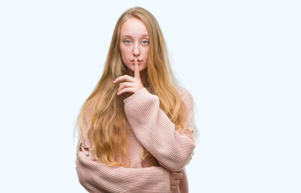 Blonde Teenager Woman Wearing Pink Sweater Asking Quiet Finger Lips — Stock Photo, Image