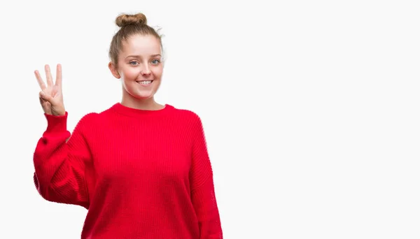 Jovem Loira Vestindo Coque Camisola Vermelha Mostrando Apontando Para Cima — Fotografia de Stock