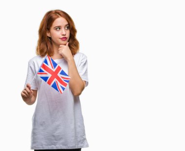 Amerika Birleşik Devletleri bayrağı izole arka plan ciddi bir yüz düşünme hakkında soru, çok karışık bir fikir üzerinde tutan genç güzel kadın