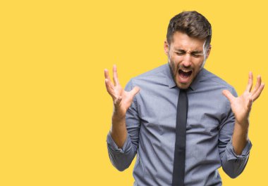 Genç iş adamı üzerinde arka plan deli kutluyor izole ve crazy arms ile başarı için kaldırdı ve heyecanlı çığlık gözleri kapalı yakışıklı. Kazanan kavramı