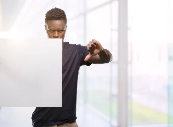 Young African American Man Holding Banner Angry Face Negative Sign — Stock Photo, Image