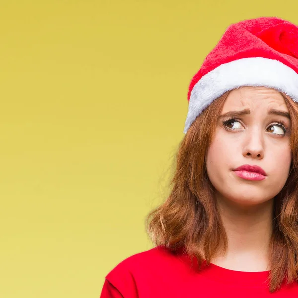 Ung Vacker Kvinna Över Isolerade Bakgrund Bär Jul Hatt Aningslös — Stockfoto