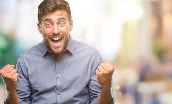 Joven Hombre Guapo Sobre Fondo Aislado Celebrando Sorprendido Sorprendido Por — Foto de Stock