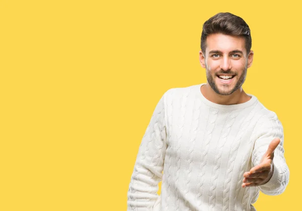 Joven Hombre Guapo Con Suéter Invierno Sobre Fondo Aislado Sonriendo —  Fotos de Stock