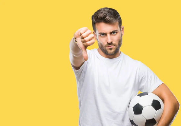 Joven Hombre Guapo Sosteniendo Pelota Fútbol Sobre Fondo Aislado Con —  Fotos de Stock