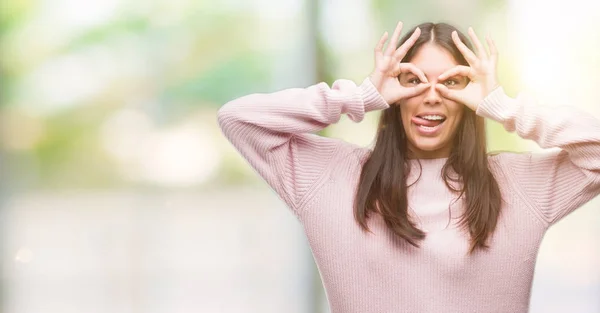 Young Beautiful Hispanic Woman Wearing Sweater Doing Gesture Binoculars Sticking — Stock Photo, Image