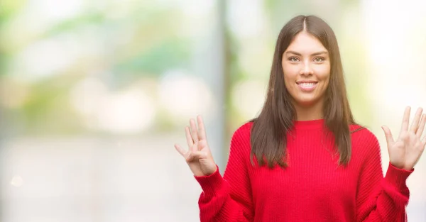 Giovane Bella Ispanico Indossa Maglione Rosso Mostrando Indicando Con Dita — Foto Stock