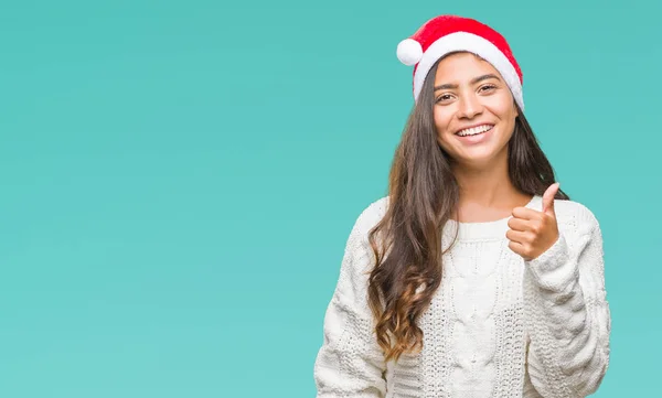 Junge Arabische Frau Trägt Weihnachtsmütze Über Isoliertem Hintergrund Und Macht — Stockfoto